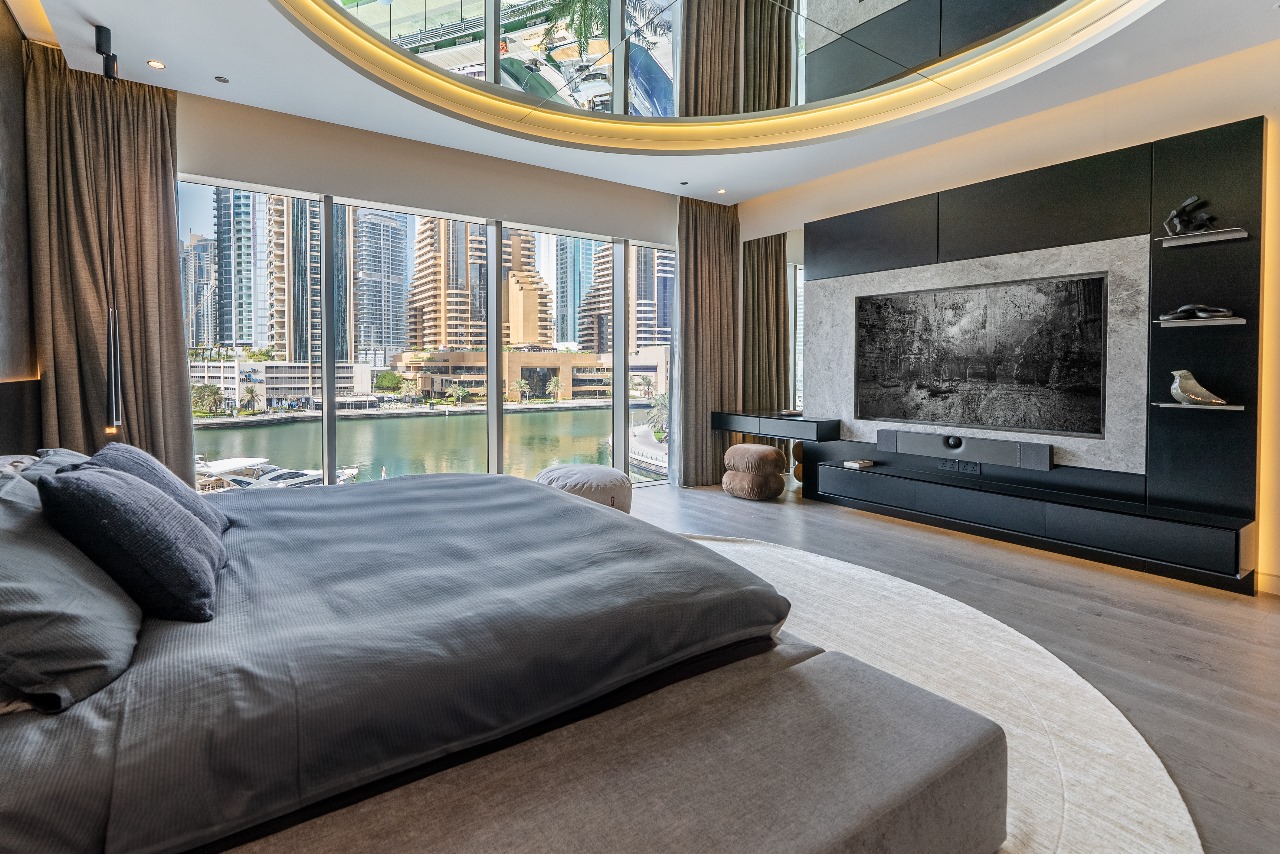 Evening bar counter lit by glass shelves