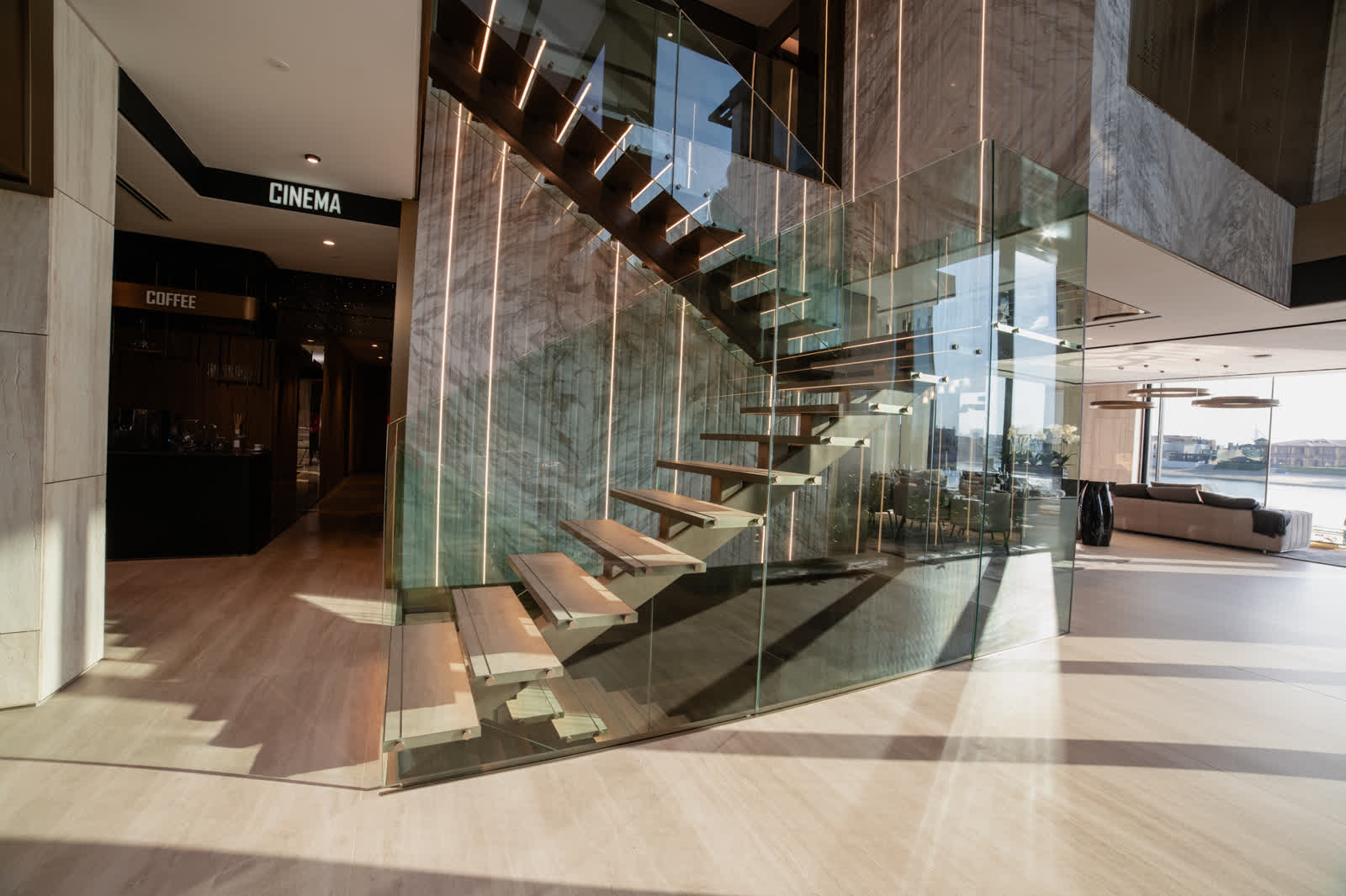 Grand foyer lit with sculptural fixtures